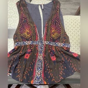 Free people top with vest like fitting